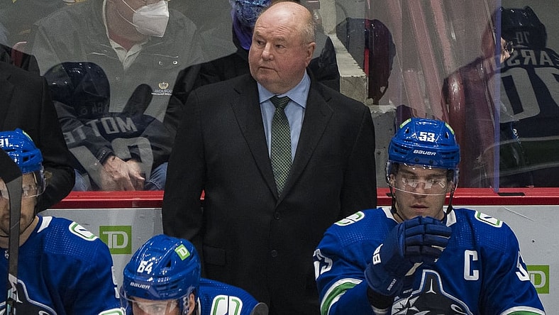 Dec 6, 2021; Vancouver, British Columbia, CAN; Vancouver Canucks head coach Bruce Boudreau on the bench during a game against the Los Angeles Kings in the first period at Rogers Arena. Mandatory Credit: Bob Frid-USA TODAY Sports
