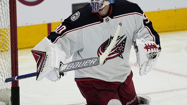 Dec 7, 2021; Toronto, Ontario, CAN; Columbus Blue Jackets goaltender Elvis Merzlikins (90) follows a rebound during warm up against the Toronto Maple Leafs at Scotiabank Arena. Mandatory Credit: John E. Sokolowski-USA TODAY Sports