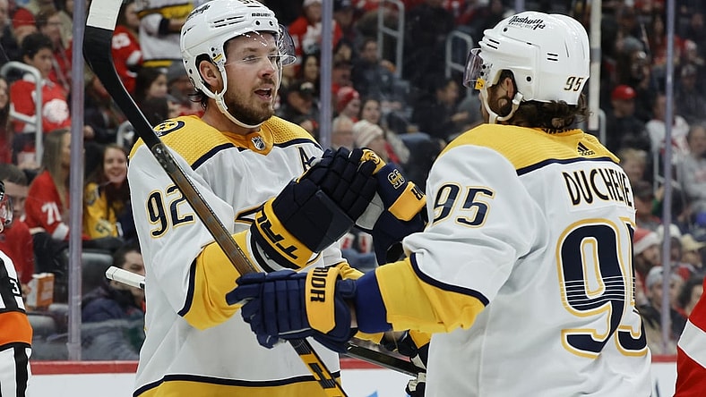Dec 7, 2021; Detroit, Michigan, USA;  Nashville Predators center Ryan Johansen (92) receives congratulations from center Matt Duchene (95) after scoring in the first period against the Detroit Red Wings in the first period at Little Caesars Arena. Mandatory Credit: Rick Osentoski-USA TODAY Sports