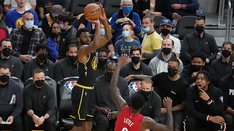 December 8, 2021; San Francisco, California, USA; Golden State Warriors forward Andrew Wiggins (22) shoots the basketball against Portland Trail Blazers forward Nassir Little (9) during the third quarter at Chase Center. Mandatory Credit: Kyle Terada-USA TODAY Sports