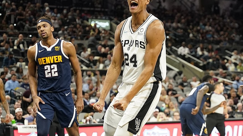 Dec 9, 2021; San Antonio, Texas, USA; San Antonio Spurs guard Devin Vassell (24) reacts after a dunk during the first half against the Denver Nuggets at AT&T Center. Mandatory Credit: Scott Wachter-USA TODAY Sports