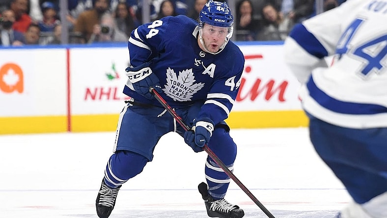Dec 9, 2021; Toronto, Ontario, CAN; Toronto Maple Leafs defenseman Morgan Rielly (44) skates with the puck against Tampa Bay Lightning in the third period at Scotiabank Arena. Mandatory Credit: Dan Hamilton-USA TODAY Sports