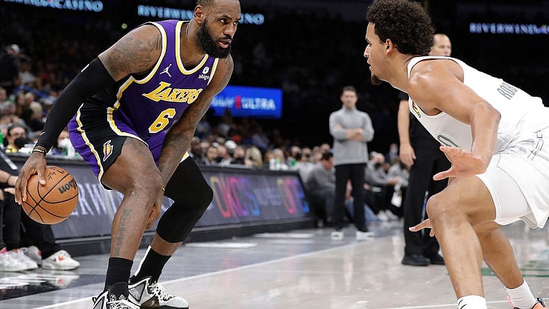 Dec 10, 2021; Oklahoma City, Oklahoma, USA; Oklahoma City Thunder forward Jeremiah Robinson-Earl (50) defends Los Angeles Lakers forward LeBron James (6) during the second quarter at Paycom Center. Mandatory Credit: Alonzo Adams-USA TODAY Sports