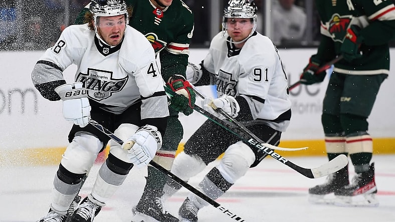 Dec 11, 2021; Los Angeles, California, USA;  Los Angeles Kings left wing Brendan Lemieux (48) and Minnesota Wild left wing Kirill Kaprizov (97) chase down the puck in the third period of the game at Staples Center. Mandatory Credit: Jayne Kamin-Oncea-USA TODAY Sports