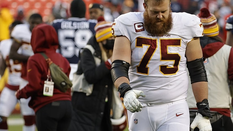 Dec 12, 2021; Landover, Maryland, USA; Washington Football Team guard Brandon Scherff (75) walks off the field after the game against the Dallas Cowboys at FedExField. Mandatory Credit: Geoff Burke-USA TODAY Sports