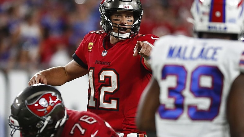 Dec 12, 2021; Tampa, Florida, USA;Tampa Bay Buccaneers quarterback Tom Brady (12) points against the Buffalo Bills  during the first half at Raymond James Stadium. Mandatory Credit: Kim Klement-USA TODAY Sports