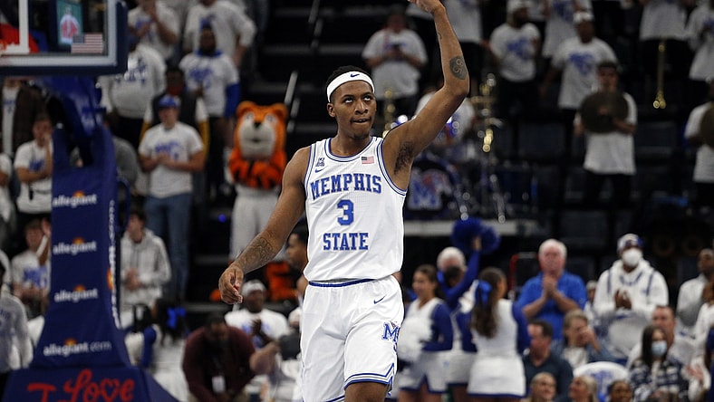Dec 14, 2021; Memphis, Tennessee, USA; Memphis Tigers guard Landers Nolley II (3) tries to pump up the crowd during the first half against the Alabama Crimson Tide at FedExForum. Mandatory Credit: Petre Thomas-USA TODAY Sports