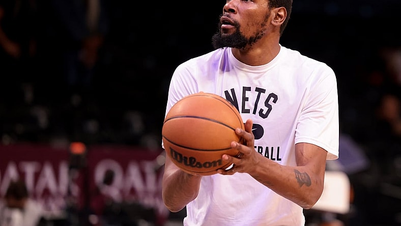 Dec 16, 2021; Brooklyn, New York, USA; Brooklyn Nets forward Kevin Durant (7) warms up before the game against the Philadelphia 76ers at Barclays Center. Mandatory Credit: Vincent Carchietta-USA TODAY Sports