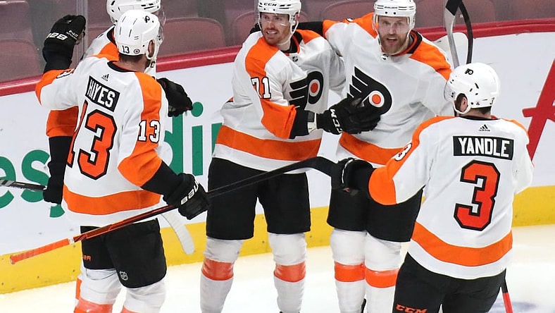 Dec 16, 2021; Montreal, Quebec, CAN; Philadelphia Flyers center Max Willman (71) celebrates his goal against Montreal Canadiens with teammates during the second period at Bell Centre. Mandatory Credit: Jean-Yves Ahern-USA TODAY Sports