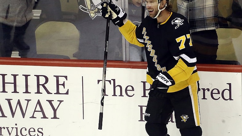 Dec 17, 2021; Pittsburgh, Pennsylvania, USA;  Pittsburgh Penguins center Jeff Carter (77) reacts after scoring the game winning goal against the Buffalo Sabres in overtime at PPG Paints Arena. The Penguins won 3-2 in overtime. Mandatory Credit: Charles LeClaire-USA TODAY Sports