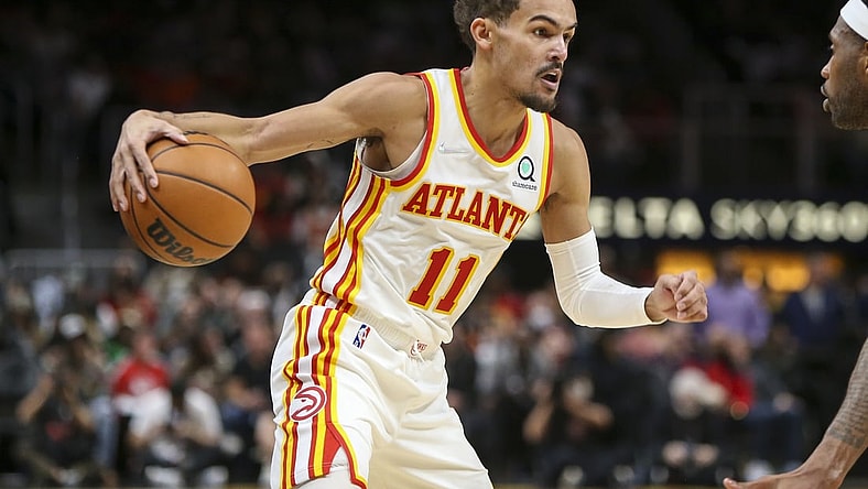 Dec 17, 2021; Atlanta, Georgia, USA; Atlanta Hawks guard Trae Young (11) dribbles against the Denver Nuggets in the second half at State Farm Arena. Mandatory Credit: Brett Davis-USA TODAY Sports