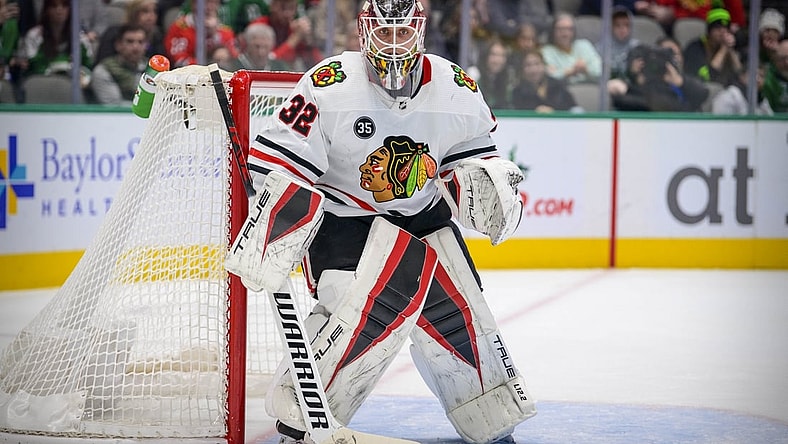 Dec 18, 2021; Dallas, Texas, USA; Chicago Blackhawks goaltender Kevin Lankinen (32) faces the Dallas Stars attack during the second period at the American Airlines Center. Mandatory Credit: Jerome Miron-USA TODAY Sports