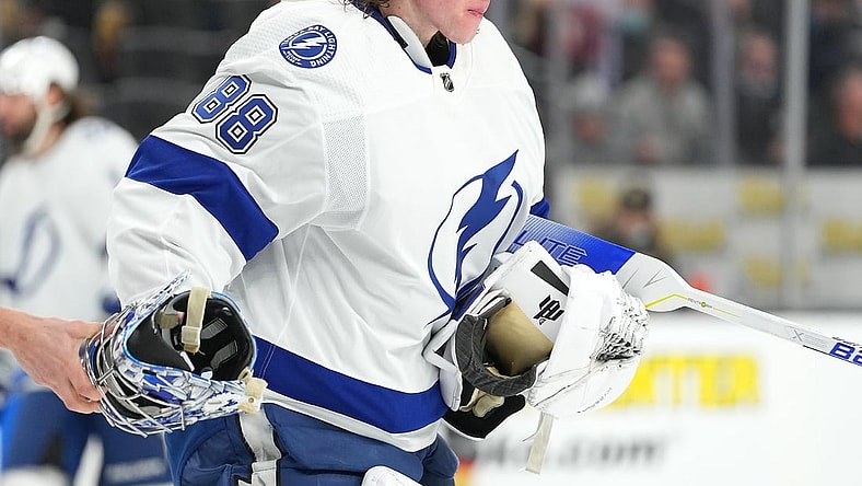 Dec 21, 2021; Las Vegas, Nevada, USA; Tampa Bay Lightning goaltender Andrei Vasilevskiy (88) skates towards his bench after having his helmet knocked off during a second period play against the Golden Knights at T-Mobile Arena. Mandatory Credit: Stephen R. Sylvanie-USA TODAY Sports