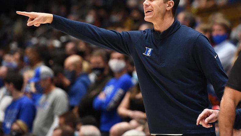 Dec 22, 2021; Durham, North Carolina, USA; Duke Blue Devils associate head coach Jon Scheyer directs the team during the second half against the Virginia Tech Hokies at Cameron Indoor Stadium.  The Blue Devils won 76-65. Mandatory Credit: Rob Kinnan-USA TODAY Sports