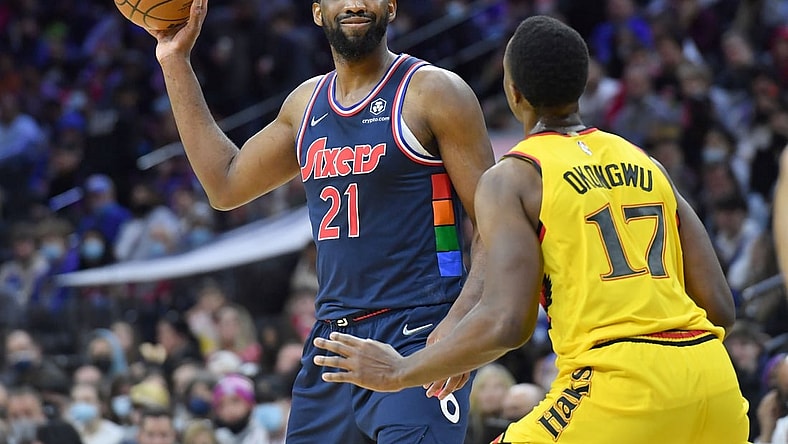 Dec 23, 2021; Philadelphia, Pennsylvania, USA;  Philadelphia 76ers center Joel Embiid (21) is defended by Atlanta Hawks forward Onyeka Okongwu (17) during the third quarter at Wells Fargo Center. Mandatory Credit: Eric Hartline-USA TODAY Sports