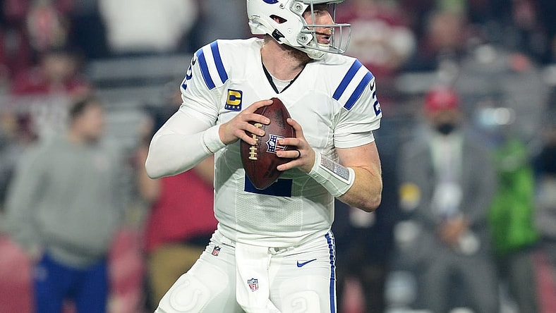 Dec 25, 2021; Glendale, Arizona, USA; Indianapolis Colts quarterback Carson Wentz (2) drops back to pass against the Arizona Cardinals during the first half at State Farm Stadium. Mandatory Credit: Joe Camporeale-USA TODAY Sports