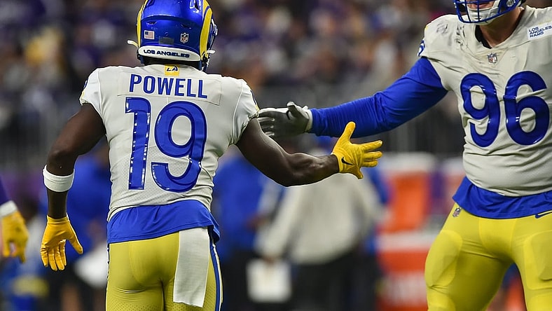 Dec 26, 2021; Minneapolis, Minnesota, USA; Los Angeles Rams wide receiver Brandon Powell (19) reacts with defensive end Mike Hoecht (96) against the Minnesota Vikings during the third quarter at U.S. Bank Stadium. Mandatory Credit: Jeffrey Becker-USA TODAY Sports
