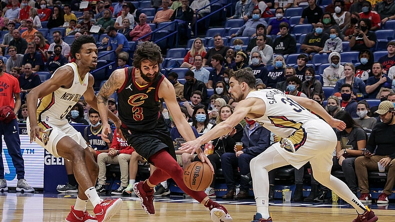 Dec 28, 2021; New Orleans, Louisiana, USA;  New Orleans Pelicans guard Tomas Satoransky (31) knocks the ball away from Cleveland Cavaliers guard Ricky Rubio (3) during the first half  at Smoothie King Center. Mandatory Credit: Stephen Lew-USA TODAY Sports