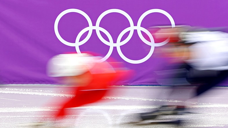Feb 10, 2018; Pyeongchang, South Korea; Skaters goes past the Olympics Rings in the men's short track 1,500m heats during the Pyeongchang 2018 Olympic Winter Games. Mandatory Credit: Geoff Burke-USA TODAY Sports