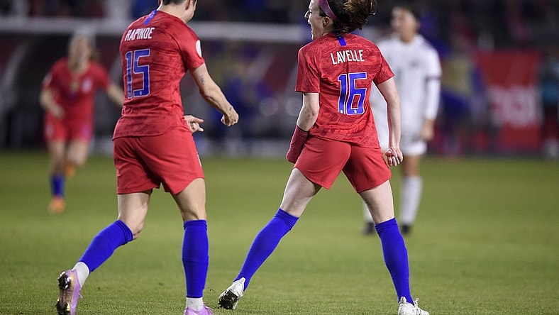 Feb 7, 2020; Los Angeles, California, USA; United States midfielder Rose Lavelle (16) celebrates after scoring a goal with forward Megan Rapinoe (15) against Mexico during the first half of the CONCACAF Women's Olympic Qualifying soccer tournament at Dignity Health Sports Park. Mandatory Credit: Kelvin Kuo-USA TODAY Sports