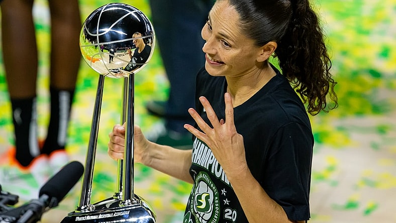 Oct 6, 2020; Bradenton, Florida, USA; Seattle Storm guard Sue Bird (10) poses with the championship trophy after winning the 2020 WNBA Finals at IMG Academy. Mandatory Credit: Mary Holt-USA TODAY Sports
