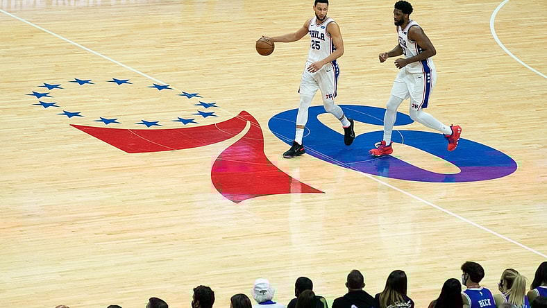 Jun 20, 2021; Philadelphia, Pennsylvania, USA; Philadelphia 76ers guard Ben Simmons (25) and center Joel Embiid (21) bring the ball up court against the Atlanta Hawks during the second quarter of game seven of the second round of the 2021 NBA Playoffs at Wells Fargo Center. Mandatory Credit: Bill Streicher-USA TODAY Sports