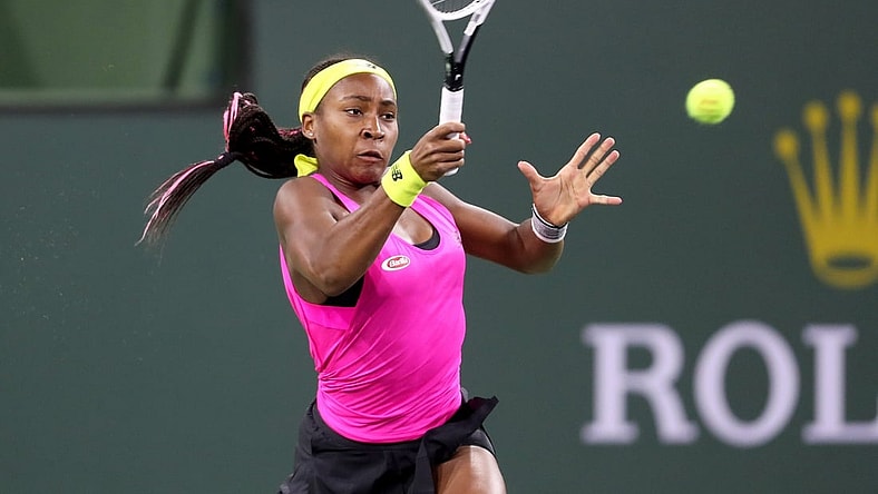 Coco Gauff of the United States returns a shot to Paula Badosa in the first set on Stadium One during the BNP Paribas Open in Indian Wells, Calif., on October 11, 2021.

Gauff Vs Badosa Bnp Paribas2085