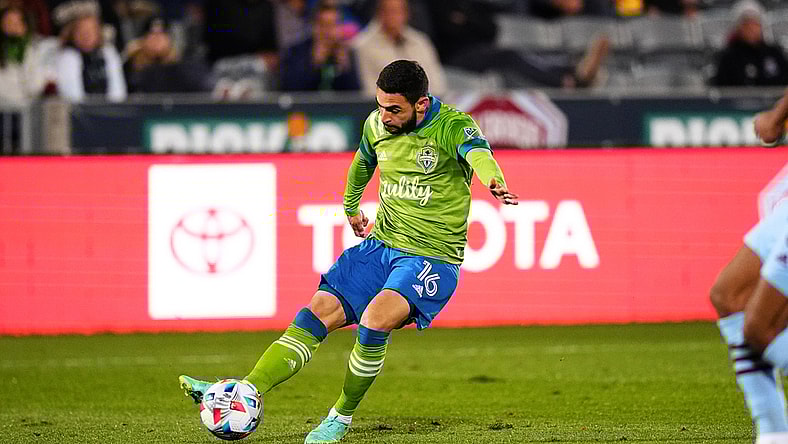Oct 20, 2021; Commerce City, Colorado, USA; Seattle Sounders midfielder Alex Roldan (16) attempts on the goal of the Colorado Rapids in the second half at Dick's Sporting Goods Park. Mandatory Credit: Ron Chenoy-USA TODAY Sports