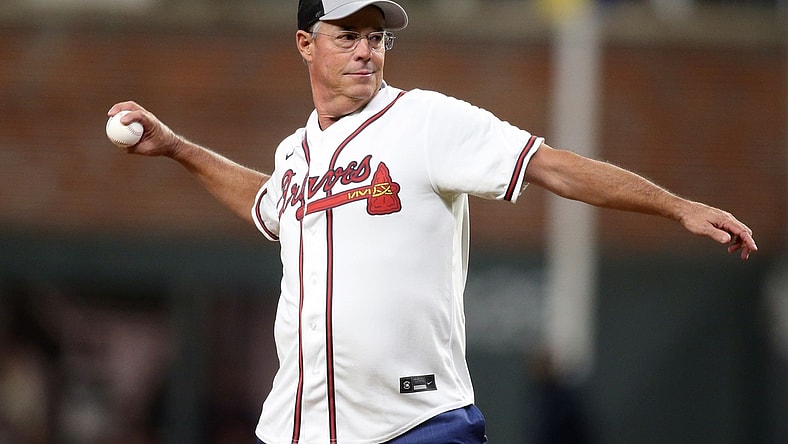 Oct 31, 2021; Atlanta, Georgia, USA; Atlanta Braves hall of fame pitcher Greg Maddux throws out the ceremonial first pitch prior to game five of the 2021 World Series against the Houston Astros at Truist Park. Mandatory Credit: Brett Davis-USA TODAY Sports