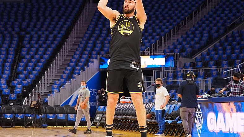 Nov 3, 2021; San Francisco, California, USA; Golden State Warriors guard Klay Thompson (11) warms up before the game against the Charlotte Hornets at Chase Center. Mandatory Credit: Kelley L Cox-USA TODAY Sports