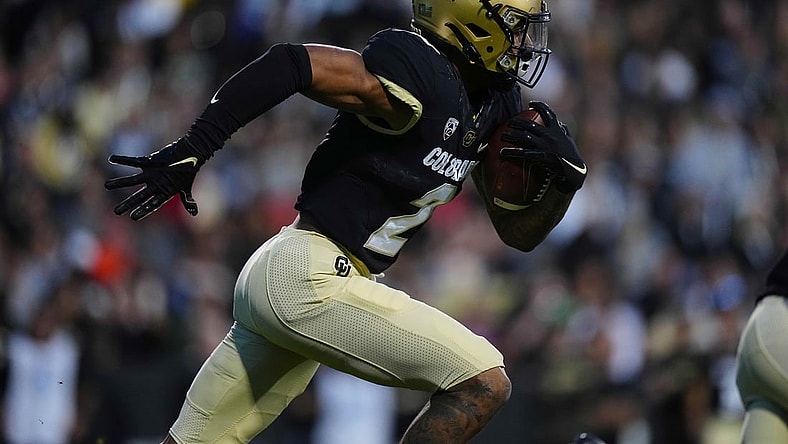 Nov 6, 2021; Boulder, Colorado, USA; Colorado Buffaloes wide receiver Brenden Rice (2) carries the ball in the second quarter against the Oregon State Beavers  at Folsom Field. Mandatory Credit: Ron Chenoy-USA TODAY Sports