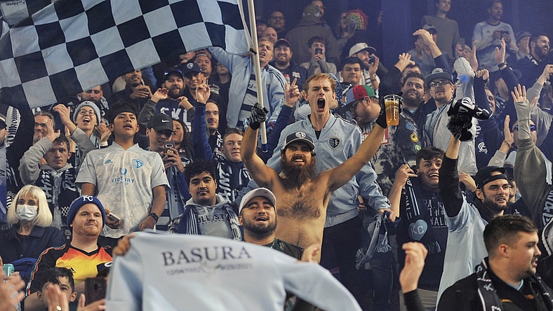 Nov 20, 2021; Kansas City, KS, USA; Sporting Kansas City fans cheer after the team beat the Vancouver Whitecaps in a round one MLS Playoff game at Children's Mercy Park. Mandatory Credit: Amy Kontras-USA TODAY Sports