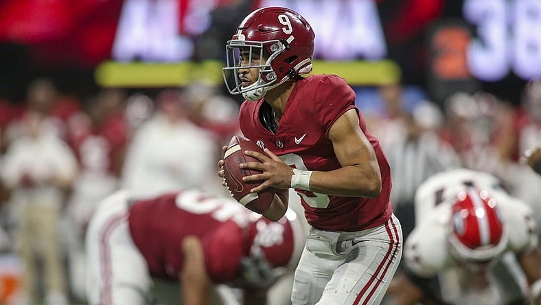 Dec 4, 2021; Atlanta, GA, USA; Alabama Crimson Tide quarterback Bryce Young (9) scrambles against the Georgia Bulldogs in the second half during the SEC championship game at Mercedes-Benz Stadium. Mandatory Credit: Brett Davis-USA TODAY Sports