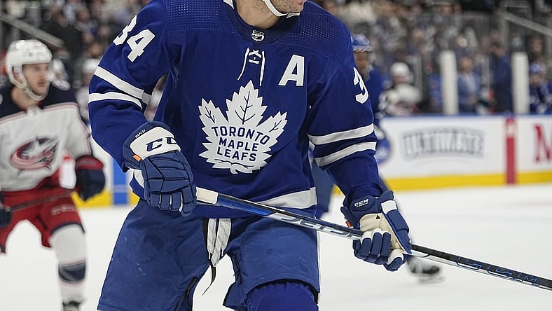 Dec 7, 2021; Toronto, Ontario, CAN; Toronto Maple Leafs forward Auston Matthews (34) follows the play against the Columbus Blue Jackets during the third period at Scotiabank Arena. Mandatory Credit: John E. Sokolowski-USA TODAY Sports