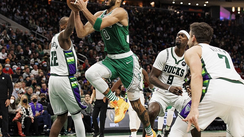 Dec 25, 2021; Milwaukee, Wisconsin, USA;  Boston Celtics forward Jayson Tatum (0) drives for the basket during the fourth quarter against the Milwaukee Bucks at Fiserv Forum. Mandatory Credit: Jeff Hanisch-USA TODAY Sports