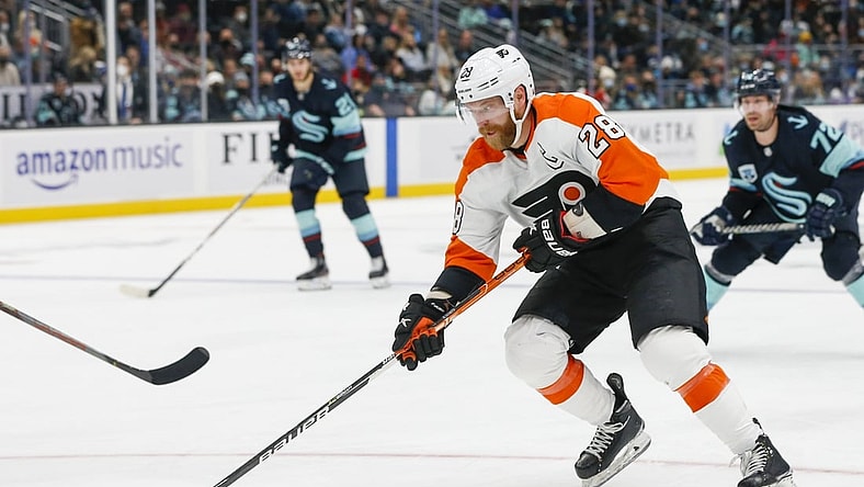 Dec 29, 2021; Seattle, Washington, USA; Philadelphia Flyers center Claude Giroux (28) skates with the puck against the Seattle Kraken during the second period at Climate Pledge Arena. Mandatory Credit: Joe Nicholson-USA TODAY Sports