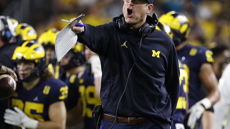 Dec 31, 2021; Miami Gardens, Florida, USA; Michigan Wolverines head coach Jim Harbaugh reacts from the sideline during the second half in the Orange Bowl college football CFP national semifinal game against the Georgia Bulldogs at Hard Rock Stadium. Mandatory Credit:  Rhona Wise-USA TODAY Sports