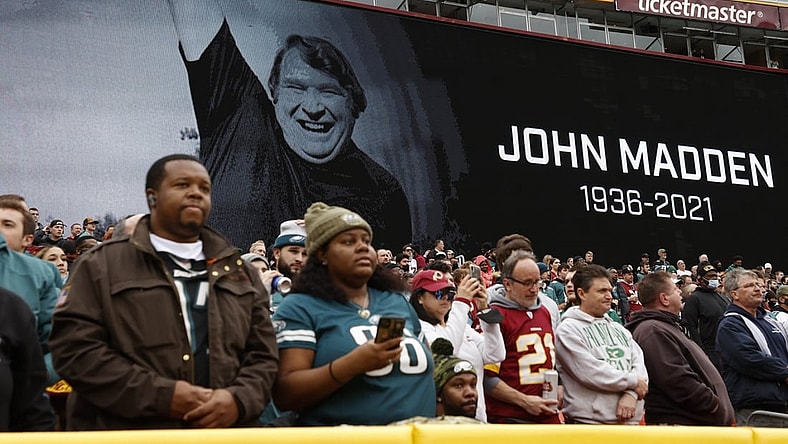 Jan 2, 2022; Landover, Maryland, USA; Fans observe a moment of silence for the late John Madden prior to the game between the Washington Football Team and the Philadelphia Eagles at FedExField. Mandatory Credit: Geoff Burke-USA TODAY Sports