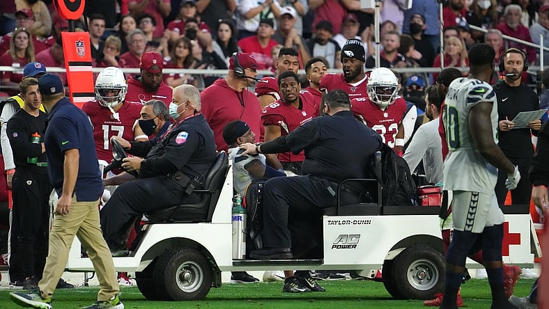 Jan 9, 2022; Glendale, Arizona, USA; Seattle Seahawks free safety Quandre Diggs (6) is carted off the field against the Arizona Cardinals during the second half at State Farm Stadium. Mandatory Credit: Joe Camporeale-USA TODAY Sports