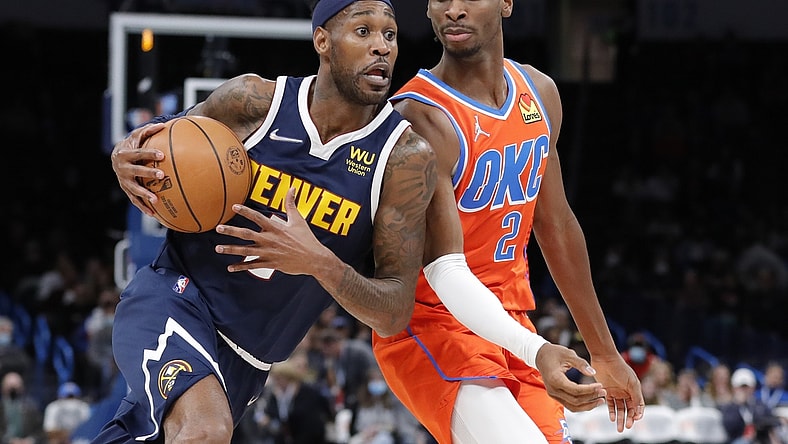 Jan 9, 2022; Oklahoma City, Oklahoma, USA; Denver Nuggets forward Will Barton (5) drives to the basket against Oklahoma City Thunder guard Shai Gilgeous-Alexander (2) during the second quarter at Paycom Center. Mandatory Credit: Alonzo Adams-USA TODAY Sports