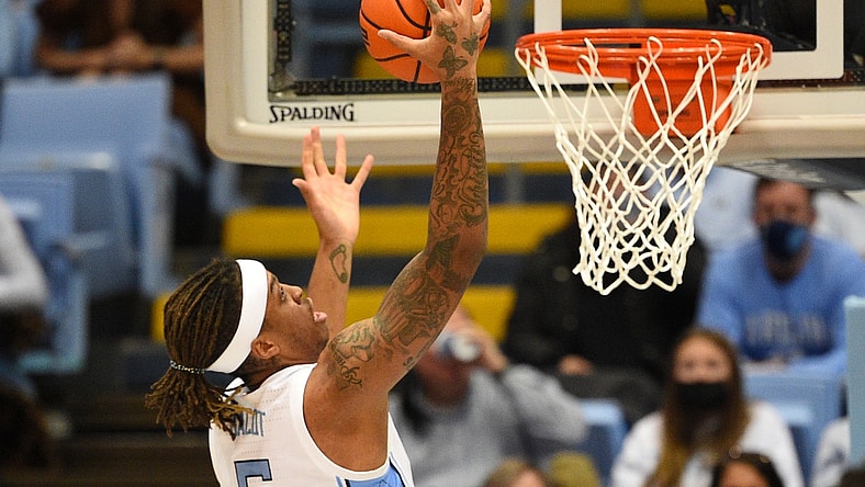 Jan 8, 2022; Chapel Hill, North Carolina, USA;  North Carolina Tar Heels forward Armando Bacot (5) grabs a rebound in the first half at Dean E. Smith Center. Mandatory Credit: Bob Donnan-USA TODAY Sports