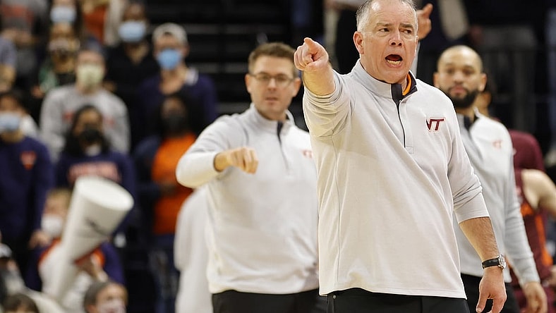 Jan 12, 2022; Charlottesville, Virginia, USA; Virginia Tech Hokies head coach Mike Young reacts from the bench against the Virginia Cavaliers during the second half at John Paul Jones Arena. Mandatory Credit: Geoff Burke-USA TODAY Sports