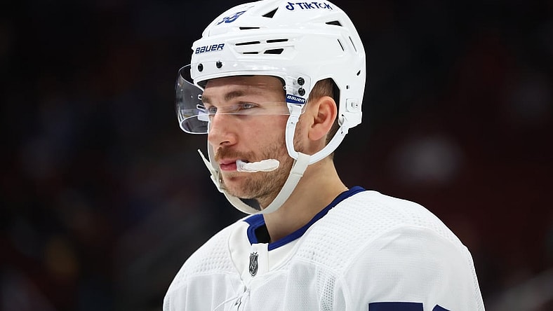 Jan 12, 2022; Glendale, Arizona, USA; Toronto Maple Leafs left wing Michael Bunting (58) against the Arizona Coyotes at Gila River Arena. Mandatory Credit: Mark J. Rebilas-USA TODAY Sports