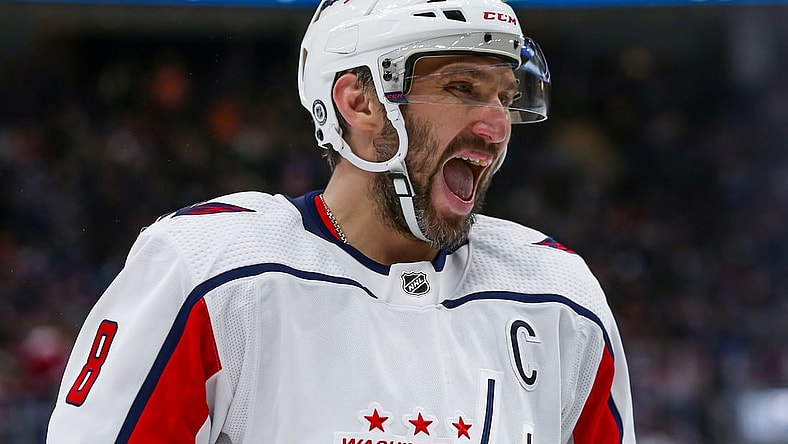 Jan 15, 2022; Elmont, New York, USA; Washington Capitals left wing Alex Ovechkin (8) reacts before a puck drop against New York Islanders during the third period at UBS Arena. Mandatory Credit: Tom Horak-USA TODAY Sports