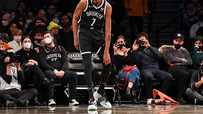 Jan 15, 2022; Brooklyn, New York, USA; Brooklyn Nets forward Kevin Durant (7) holds his knee after a collision against the New Orleans Pelicans during the second quarter at Barclays Center. Mandatory Credit: Dennis Schneidler-USA TODAY Sports