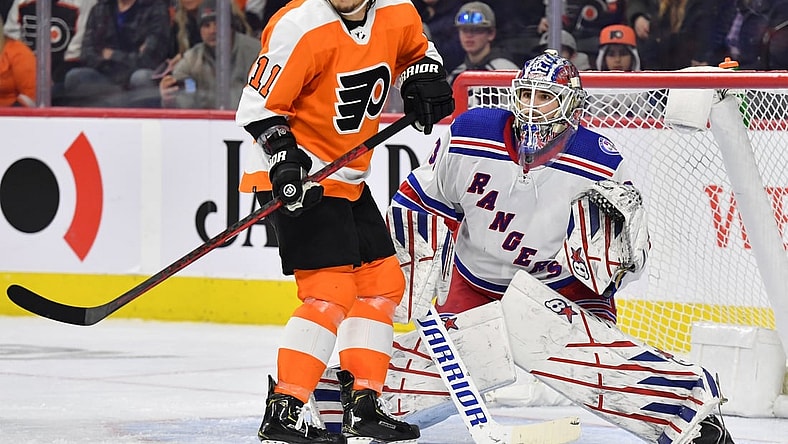 Jan 15, 2022; Philadelphia, Pennsylvania, USA; Philadelphia Flyers right wing Travis Konecny (11) in front of goaltender Igor Shesterkin (31) during the second period at Wells Fargo Center. Mandatory Credit: Eric Hartline-USA TODAY Sports