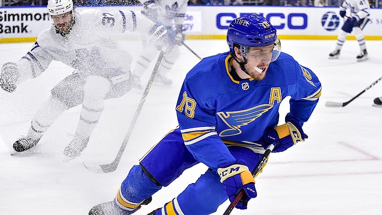 Jan 15, 2022; St. Louis, Missouri, USA;  St. Louis Blues center Robert Thomas (18) controls the puck against the Toronto Maple Leafs during the second period at Enterprise Center. Mandatory Credit: Jeff Curry-USA TODAY Sports