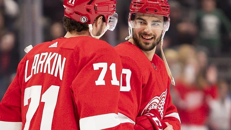 Jan 15, 2022; Detroit, Michigan, USA; Detroit Red Wings center Joe Veleno (90) smiles at center Dylan Larkin (71) after the game against the St. Louis Blues at Little Caesars Arena. Mandatory Credit: Raj Mehta-USA TODAY Sports