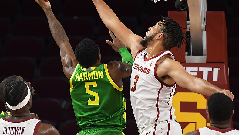 Jan 15, 2022; Los Angeles, California, USA;  USC Trojans forward Isaiah Mobley (3) blocks a shot by Oregon Ducks guard De'Vion Harmon (5) in the first half at Galen Center. Mandatory Credit: Jayne Kamin-Oncea-USA TODAY Sports