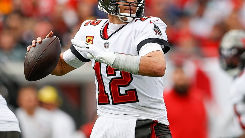 Jan 16, 2022; Tampa, Florida, USA; Tampa Bay Buccaneers quarterback Tom Brady (12) drops back to pass in the first half against the Philadelphia Eagles in a NFC Wild Card playoff football game at Raymond James Stadium. Mandatory Credit: Nathan Ray Seebeck-USA TODAY Sports